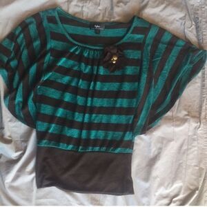 Teal and green, with a flower